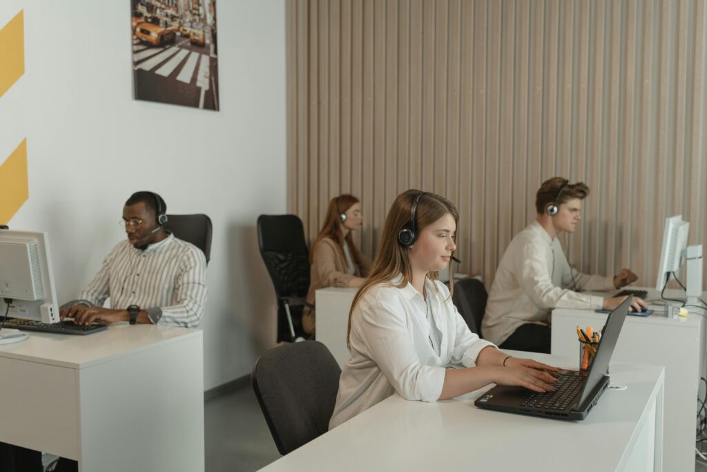 pexels-photo-5453909-5453909 Four People Working in Call Center Office